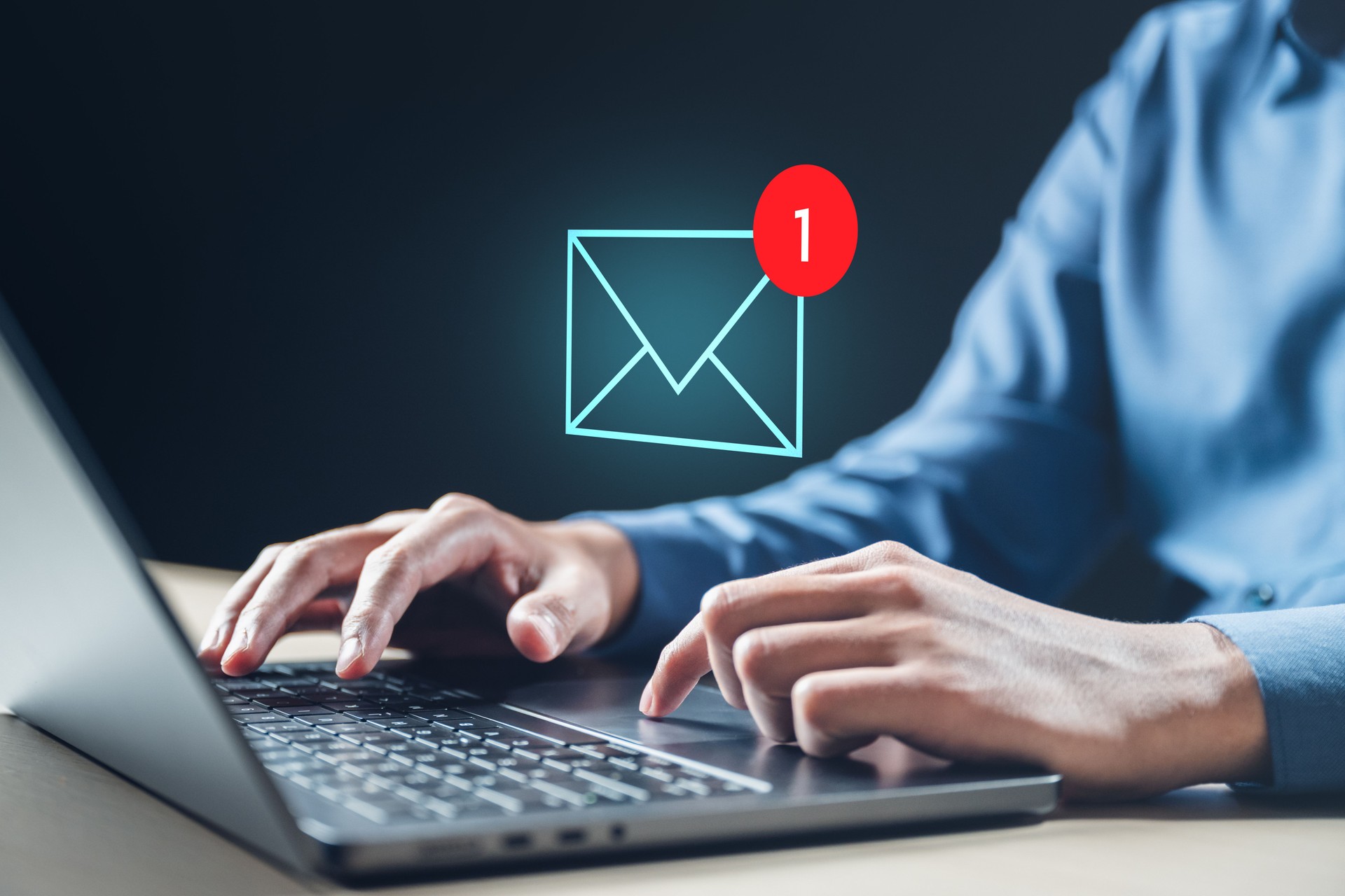 Email marketing concept. Mail newsletter send. Receive envelope email. Message contact reminder. Technology marketing. A person is using a laptop computer, typing on the keyboard.